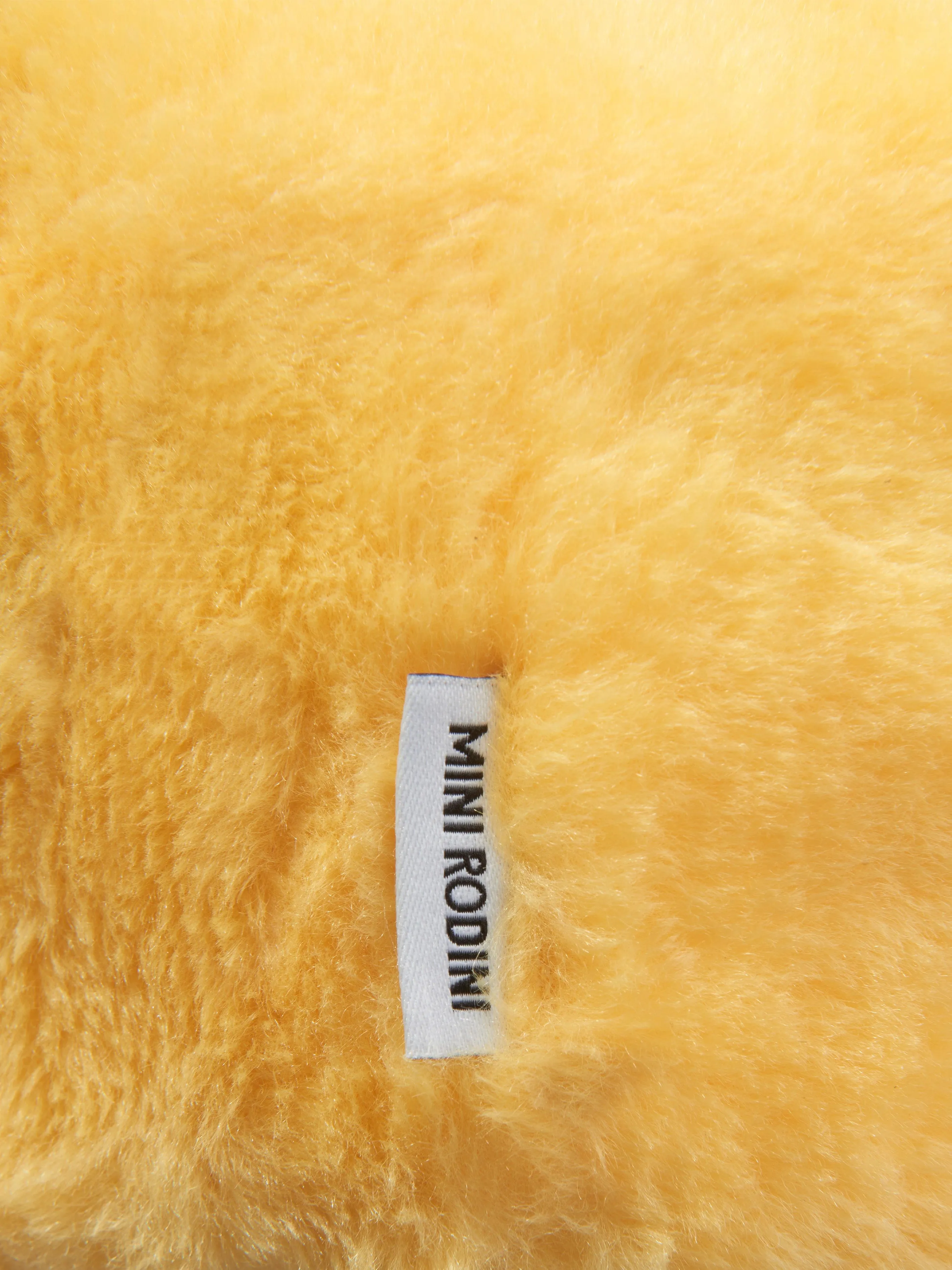 Mini Rodini Baby Faux Fur Cap in Yellow